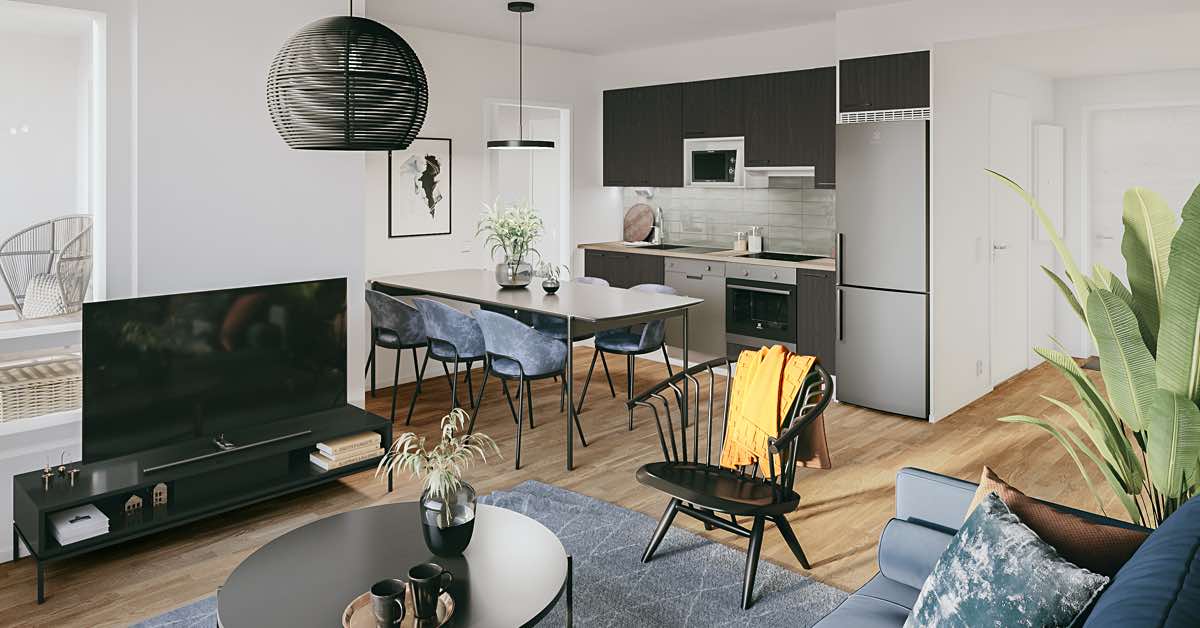 Kodikkaasti sisustettu olohuone-keittiö, jossa keittiön kaapistot ovat mustat ja laatat kauniin vihertävät.